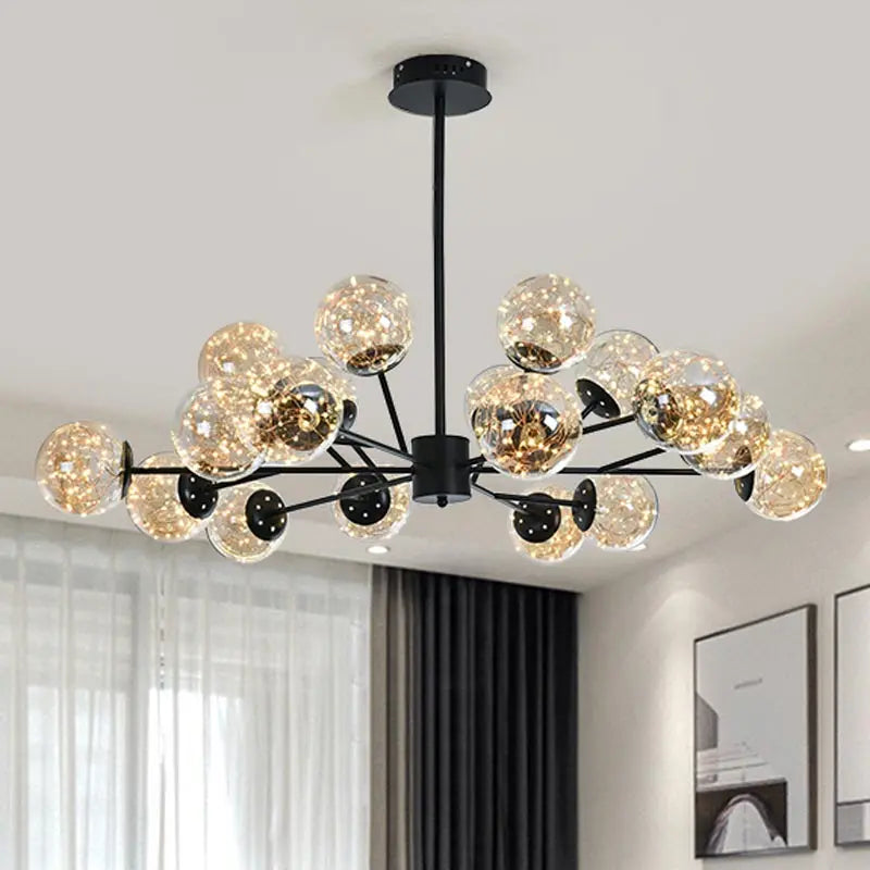 moderne stervormige kroonluchter met decoratieve glazen kap