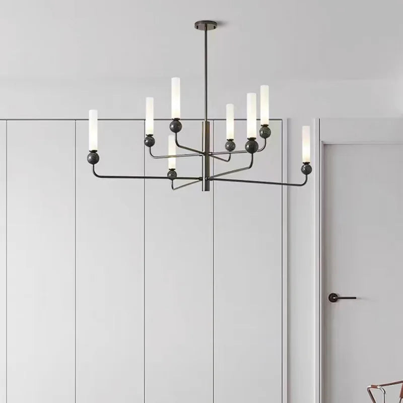 eenvoudige en moderne kroonluchter van messing met acryl marmeren bol