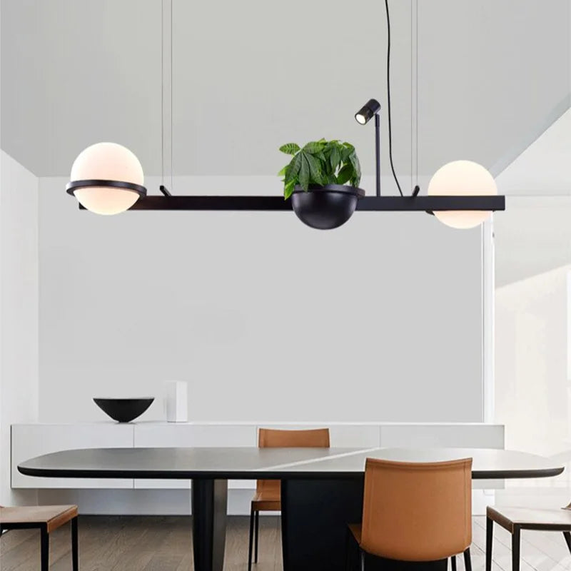 nordische kroonluchter met kunstplant in hangende pot